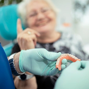Can Dentures Break While Eating
